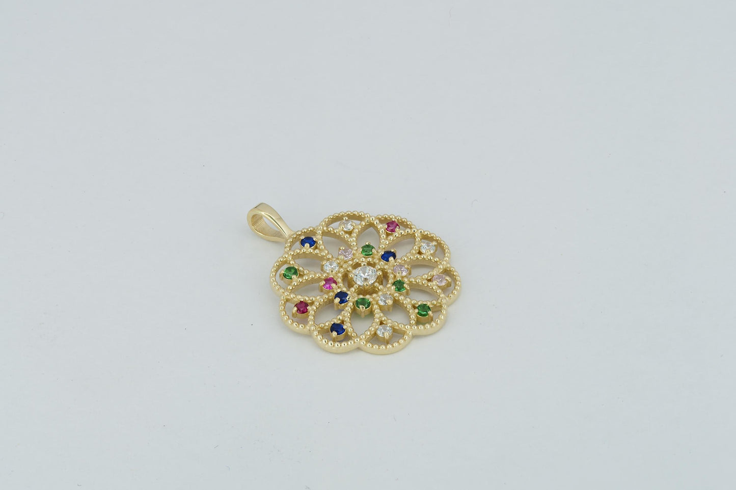 14k gold pattern pendant with multicolor gemstones