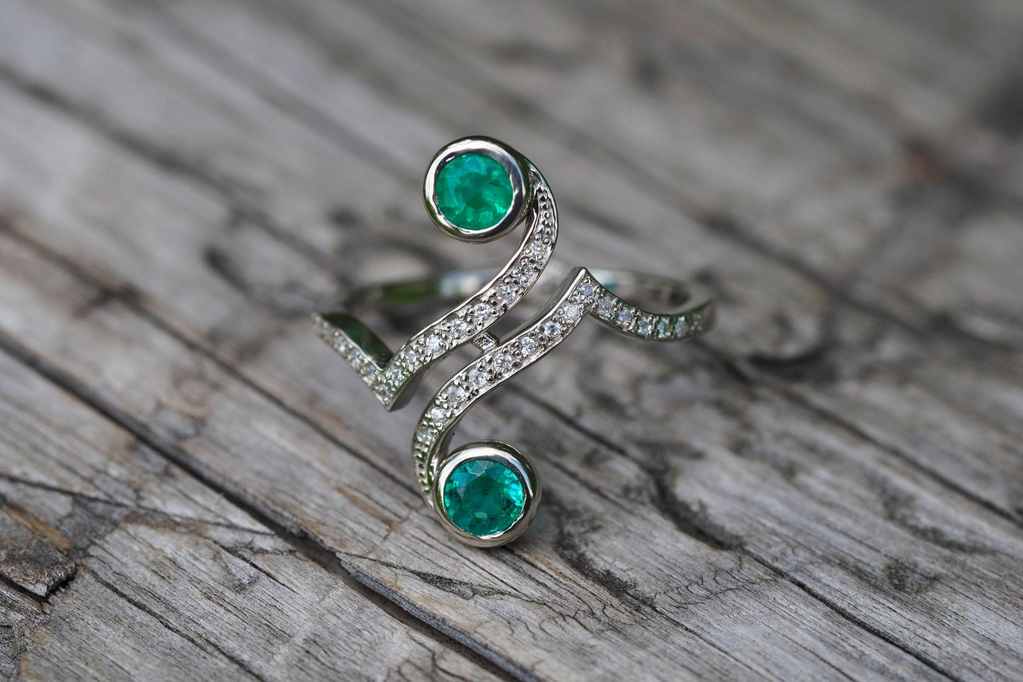 Vintage inspired two emeralds 14k gold ring.