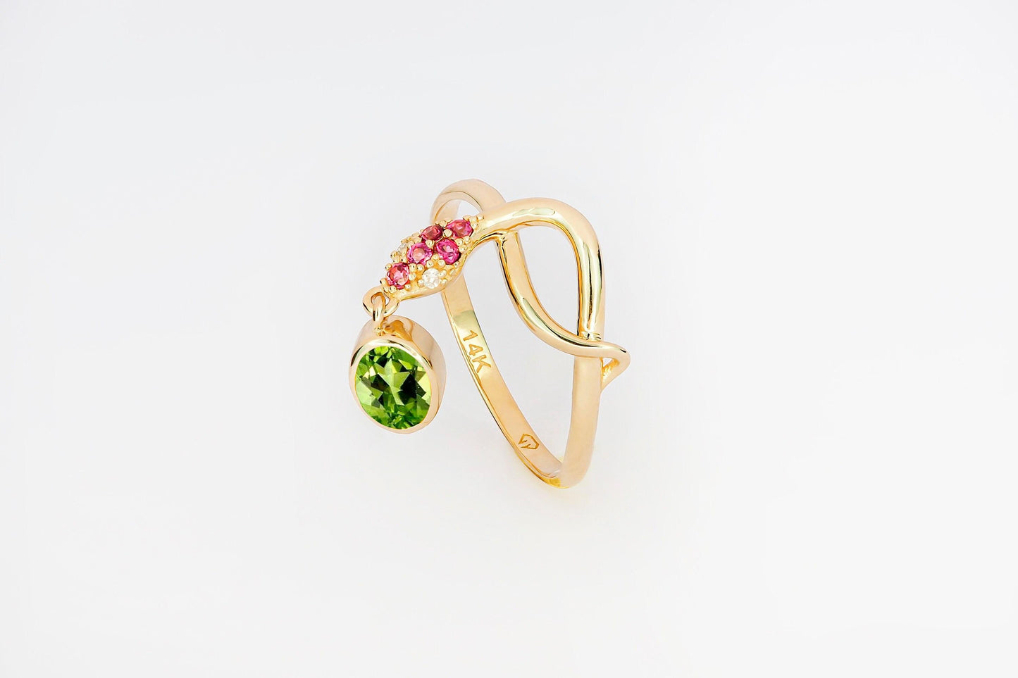 Snake ring with Peridot in 14k gold