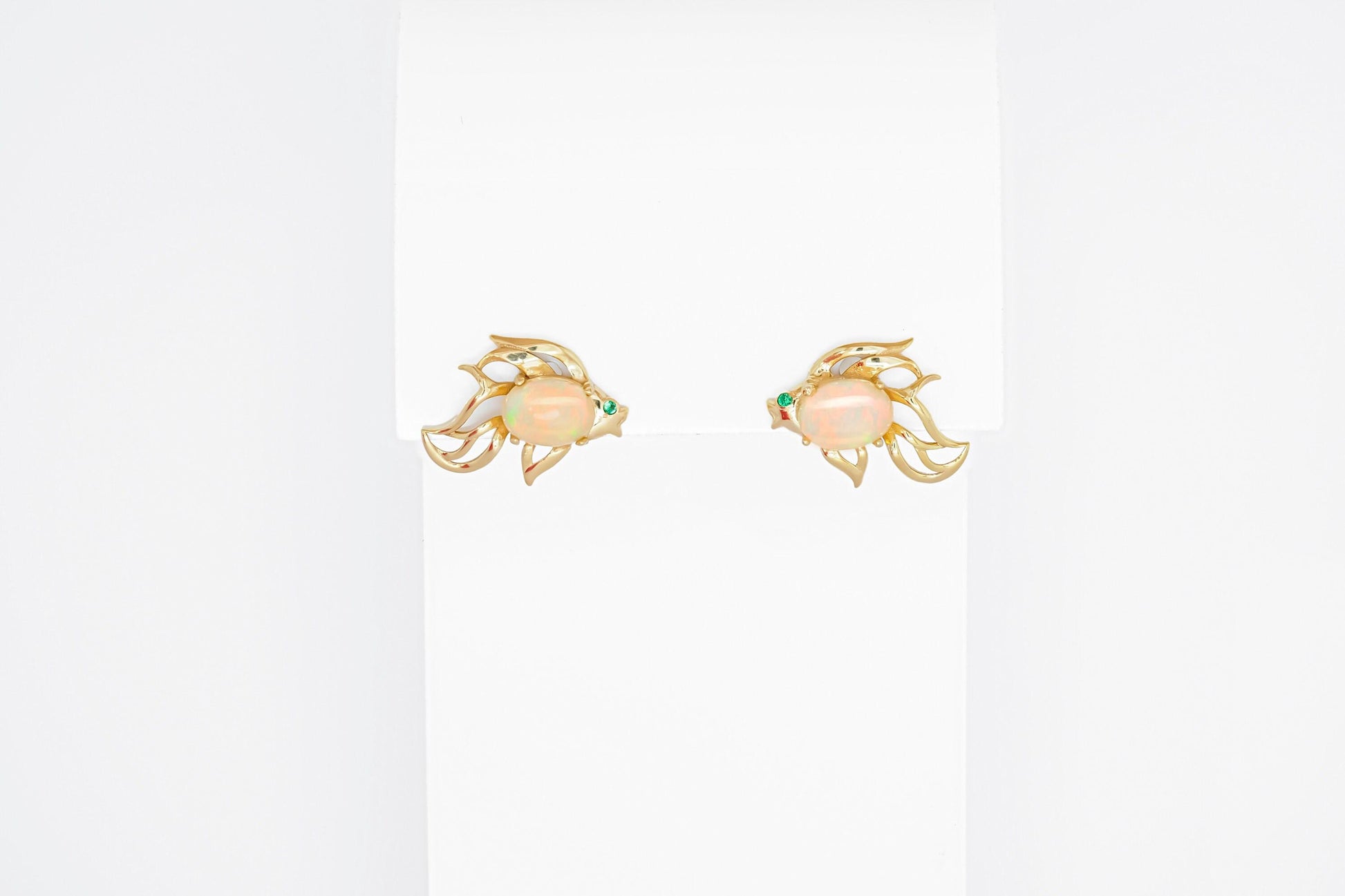 14k gold Fish earrings studs set in 14k gold