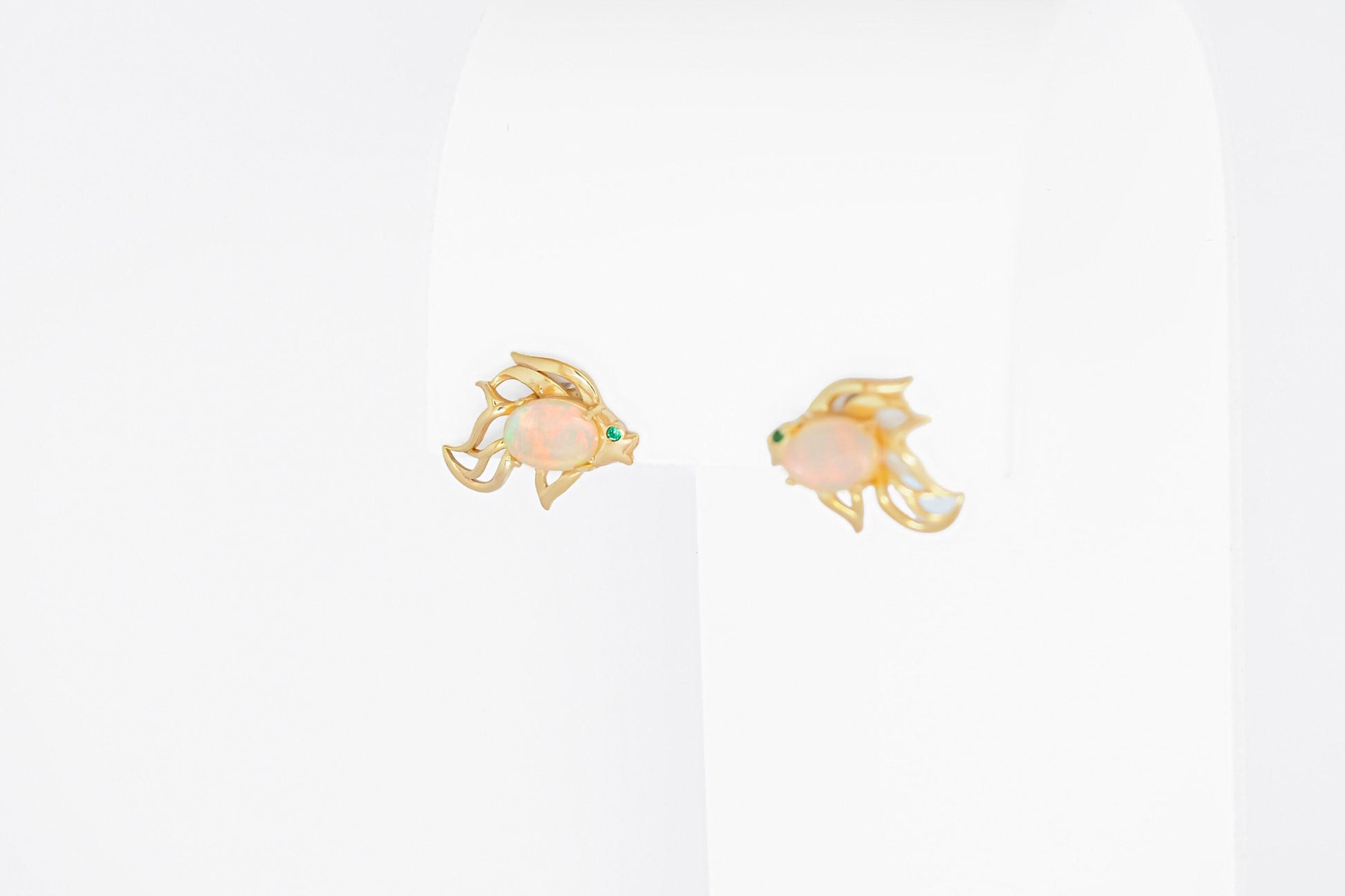 14k gold Fish earrings studs set in 14k gold