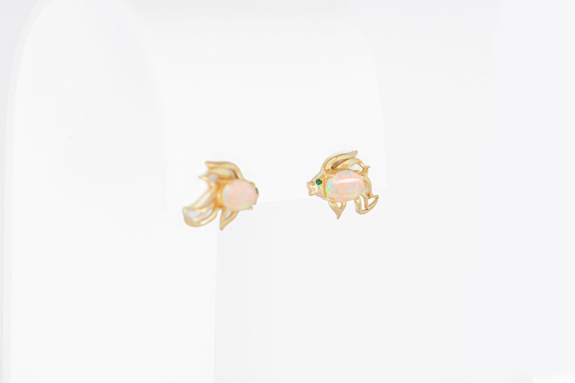 14k gold Fish earrings studs set in 14k gold