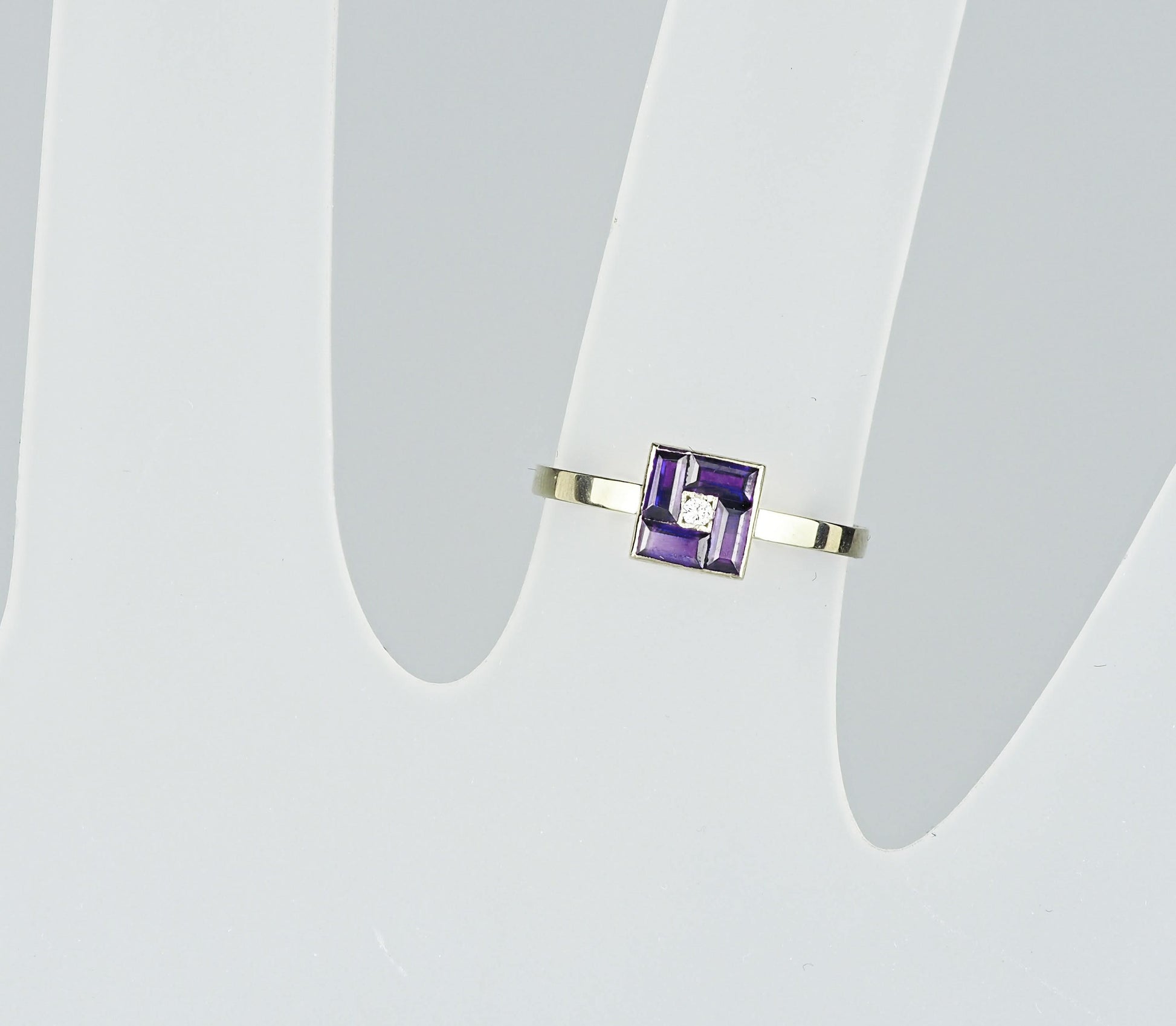 Purple baguette 14k gold ring.