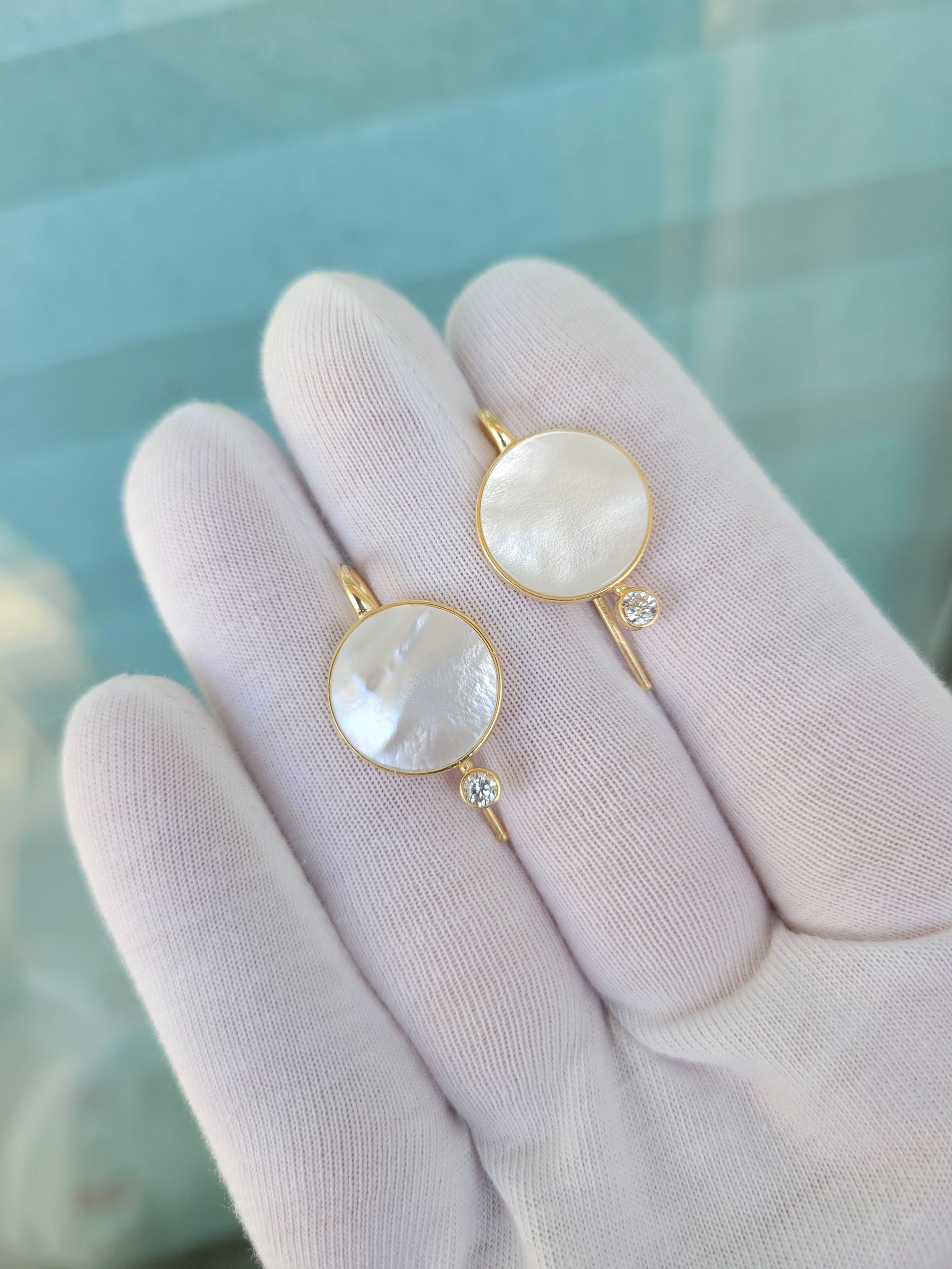 White Mother Of Pearl Shell 14k gold Earrings with moissanite.