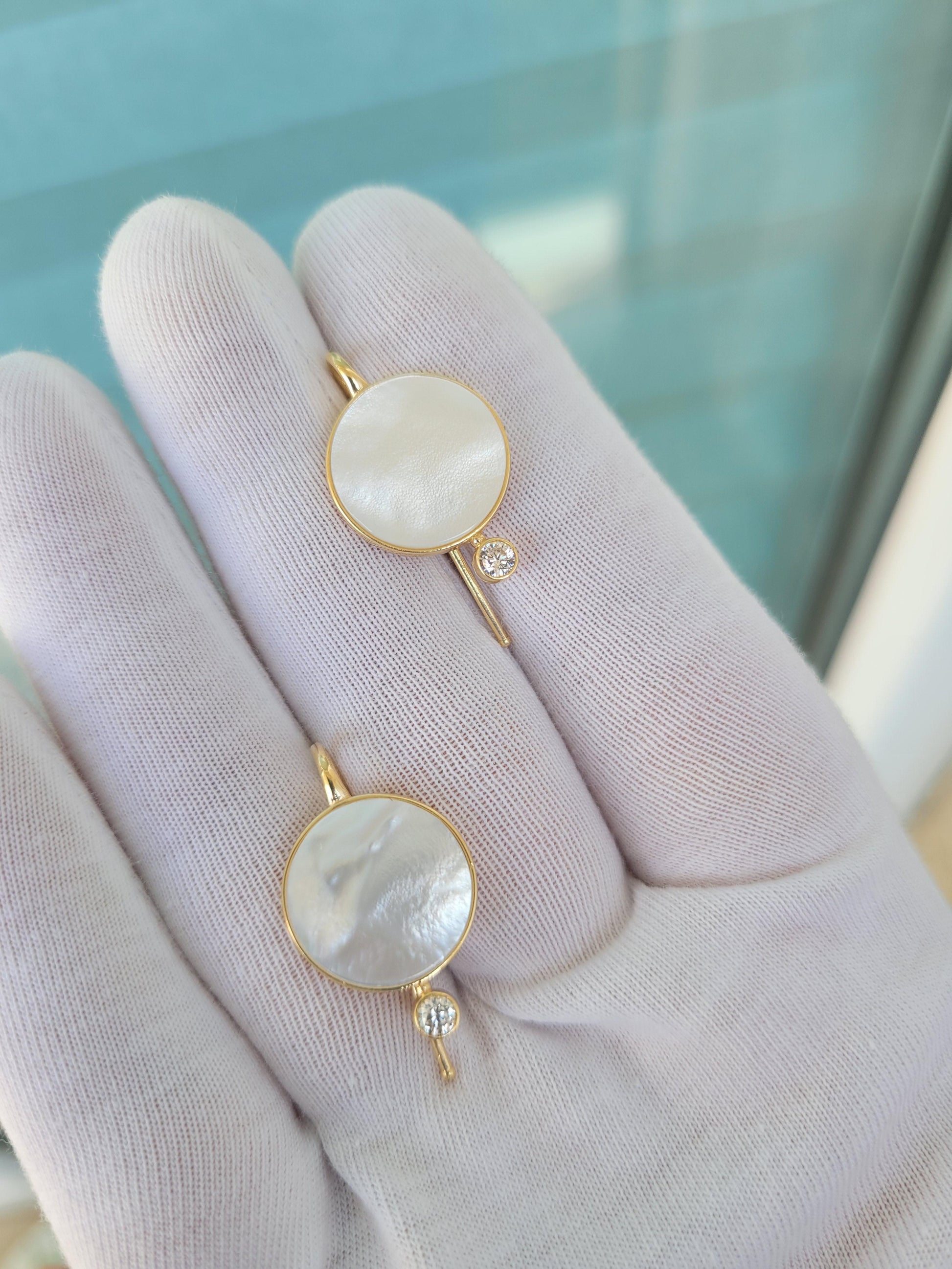 White Mother Of Pearl Shell 14k gold Earrings with moissanite.