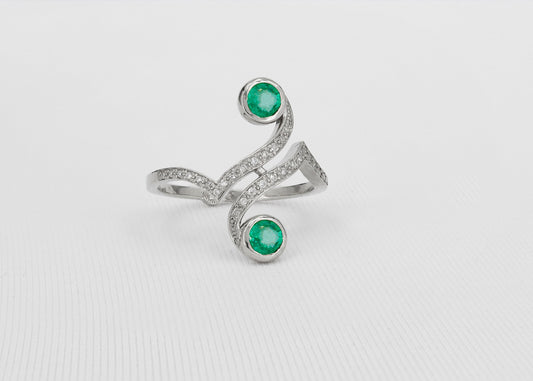 Vintage inspired two emeralds 14k gold ring.