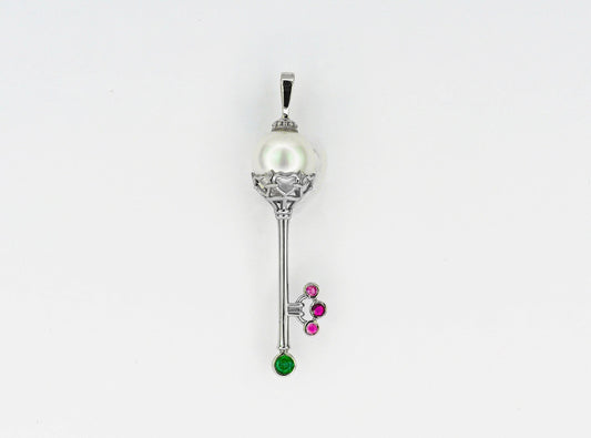 Key pendant with pearl in 14k gold