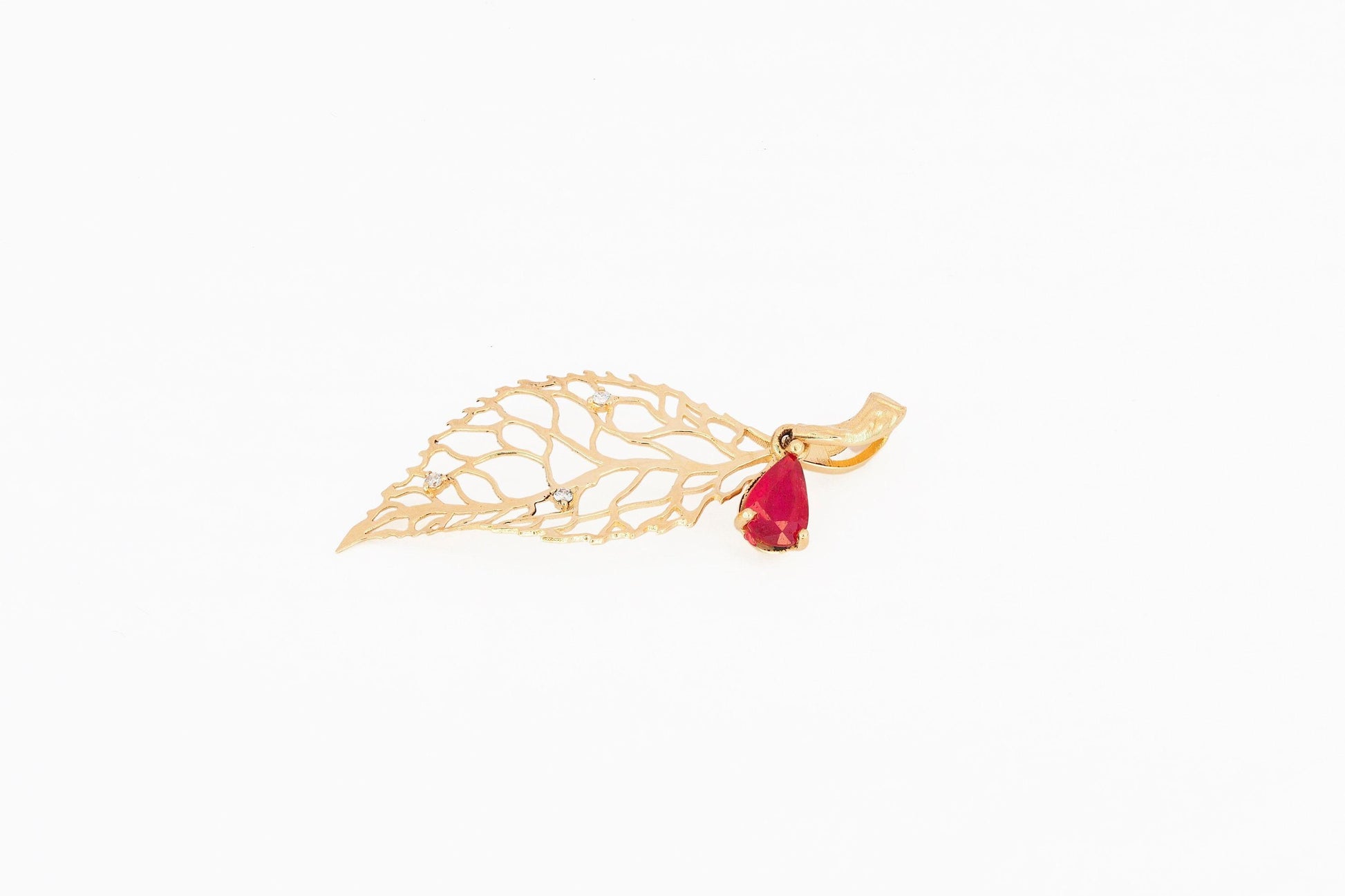 Leaf pendant with ruby and diamonds in 14k gold