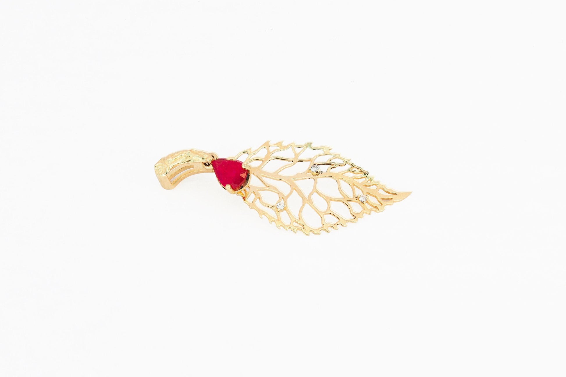 Leaf pendant with ruby and diamonds in 14k gold