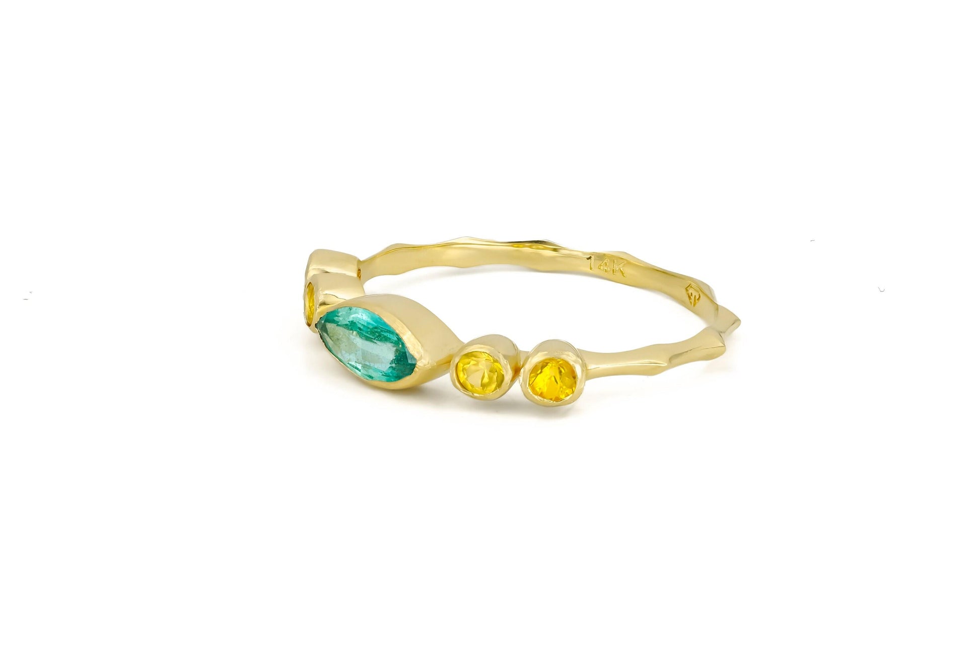 Marquise emerald ring in 14k gold