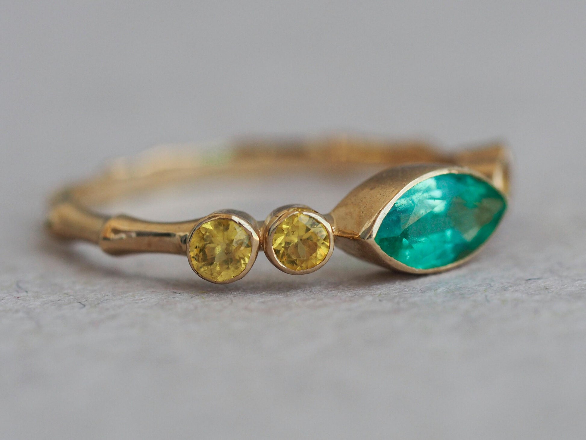 Marquise emerald ring in 14k gold