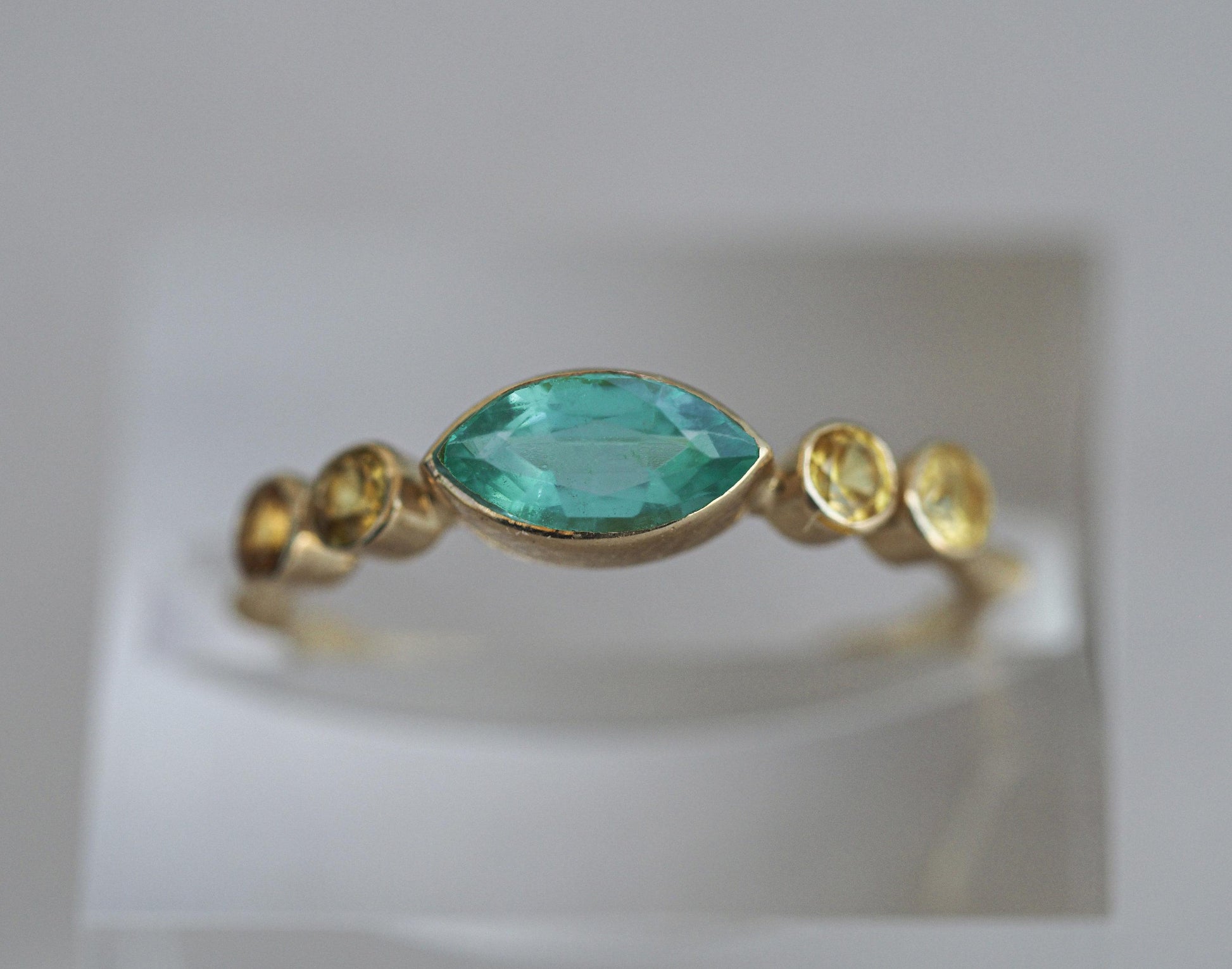 Marquise emerald ring in 14k gold
