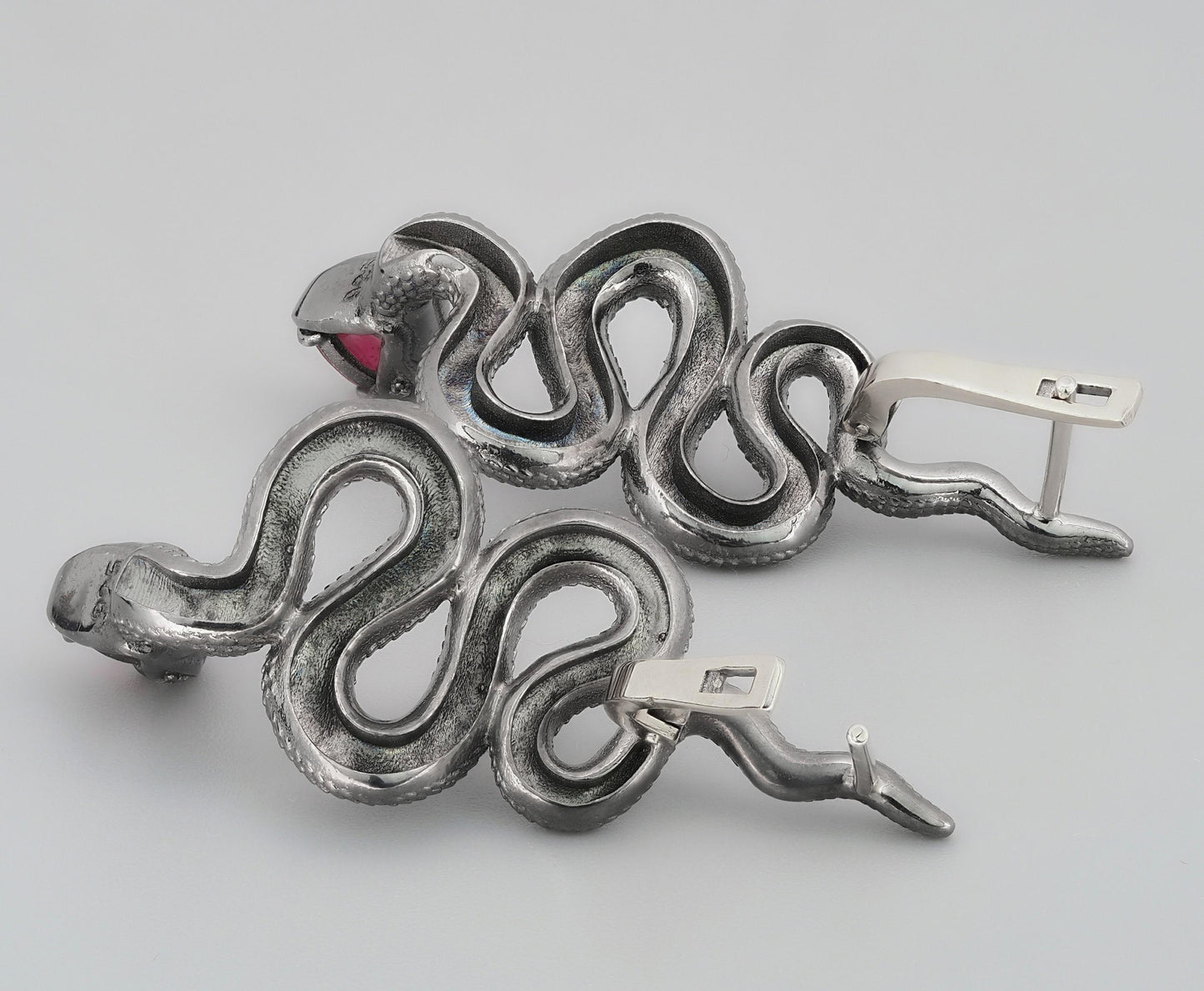 Massive snake earrings with rubies