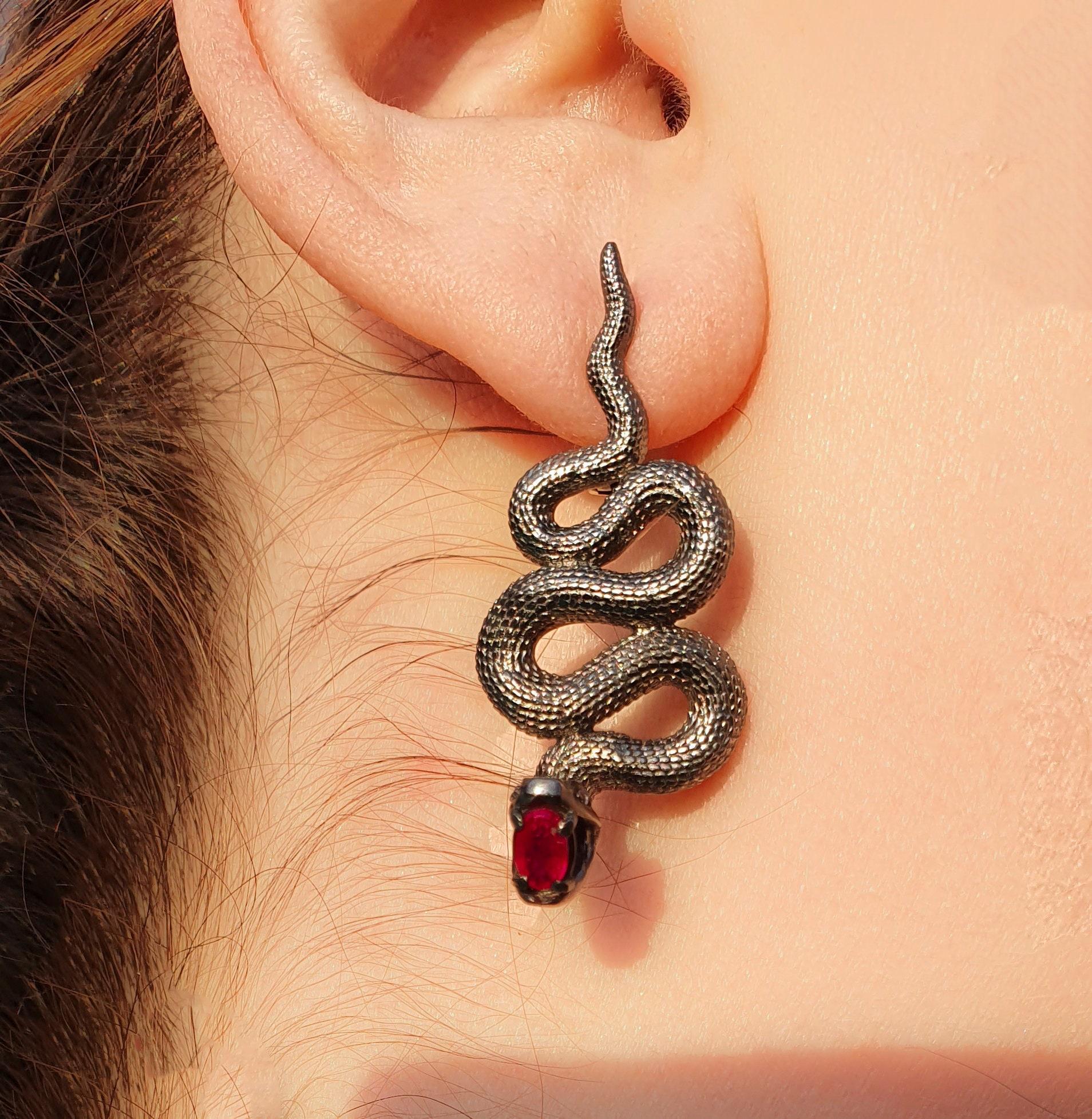 Massive snake earrings with rubies