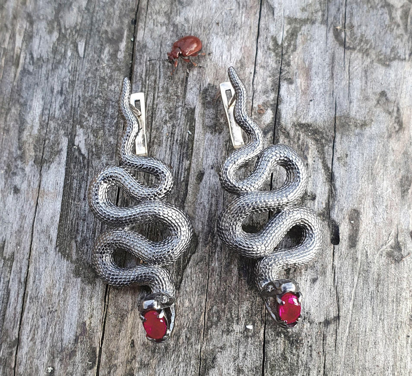 Massive snake earrings with rubies