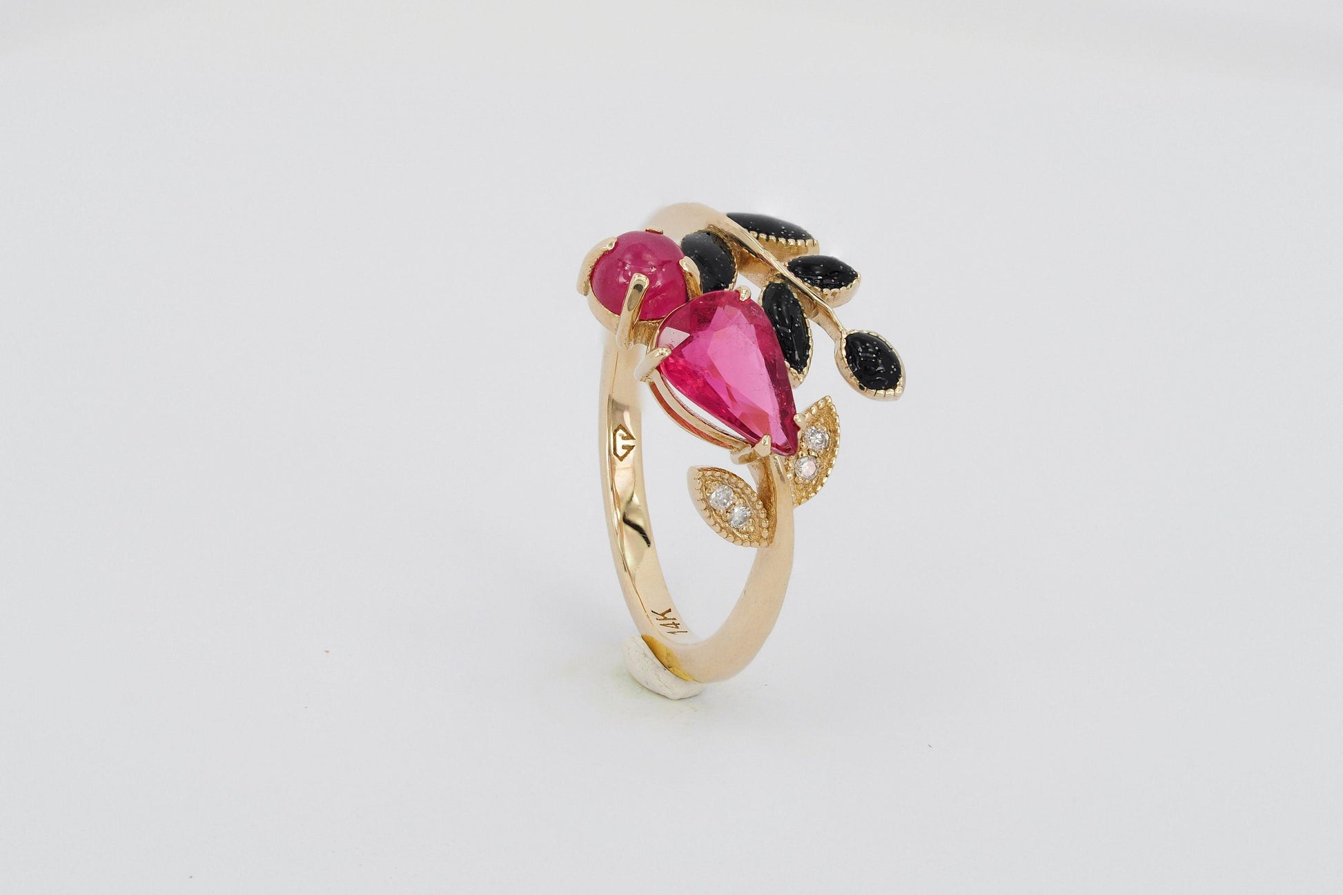 Pear, cabochon ruby 14k gold