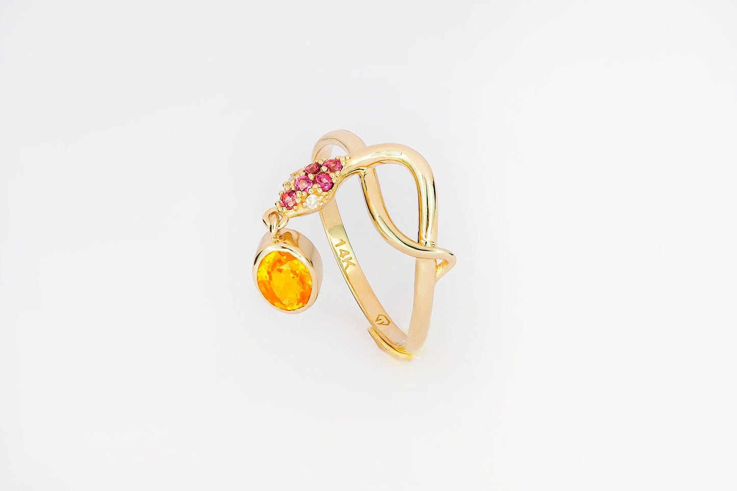 Snake ring with sapphire, diamonds in 14k gold