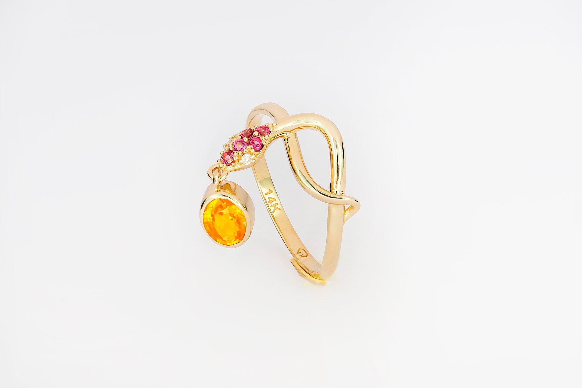 Snake ring with sapphire, diamonds in 14k gold