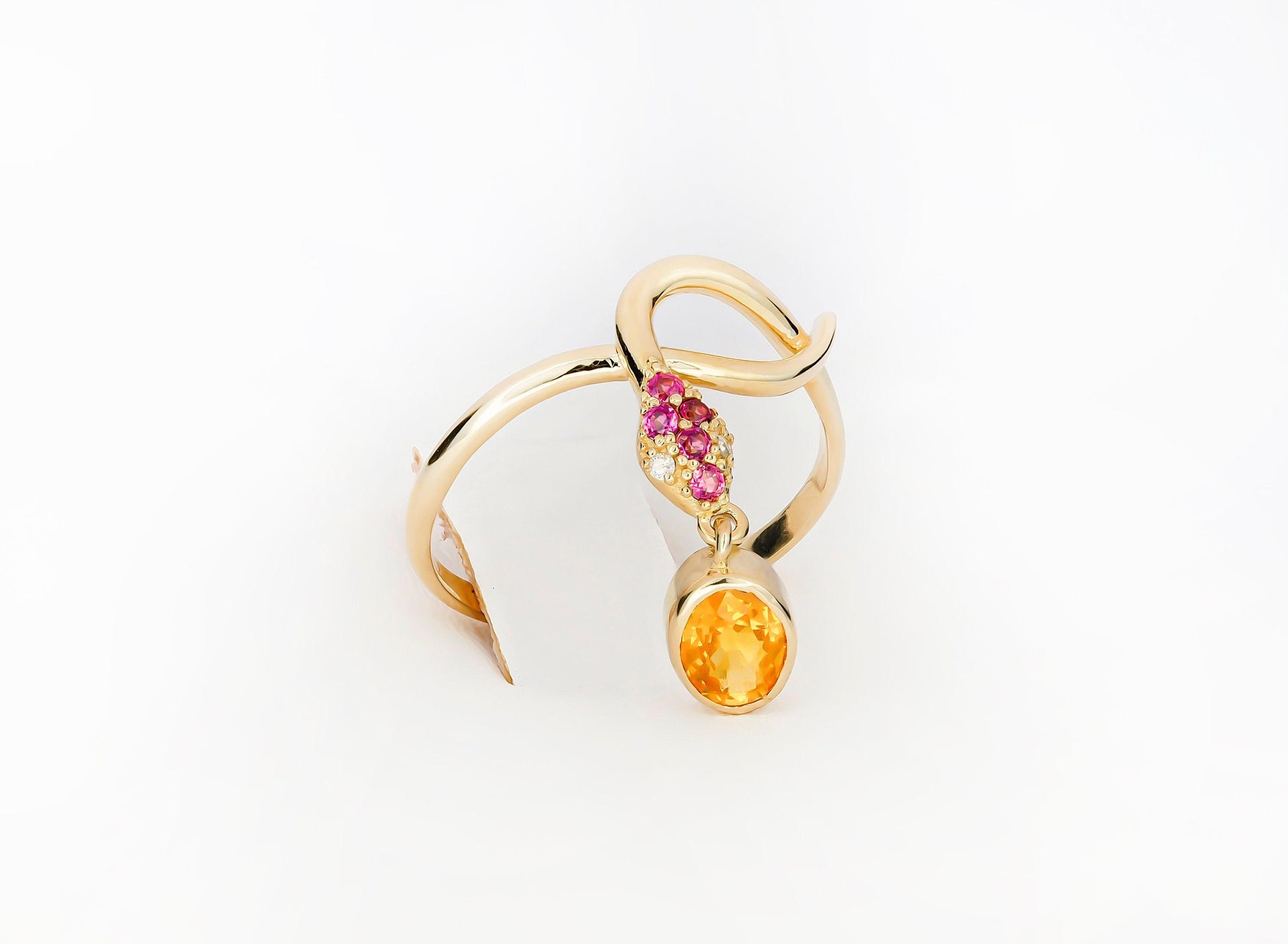 Snake ring with sapphire, diamonds in 14k gold