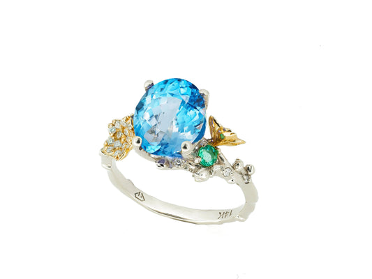 Blue Topaz cocktail ring in 14k gold