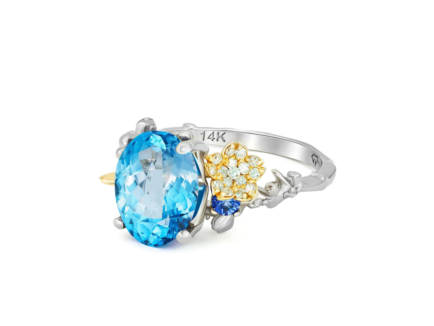Blue Topaz cocktail ring in 14k gold