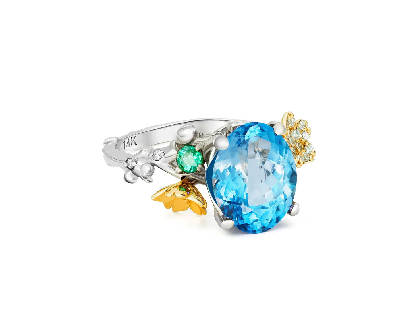 Blue Topaz cocktail ring in 14k gold