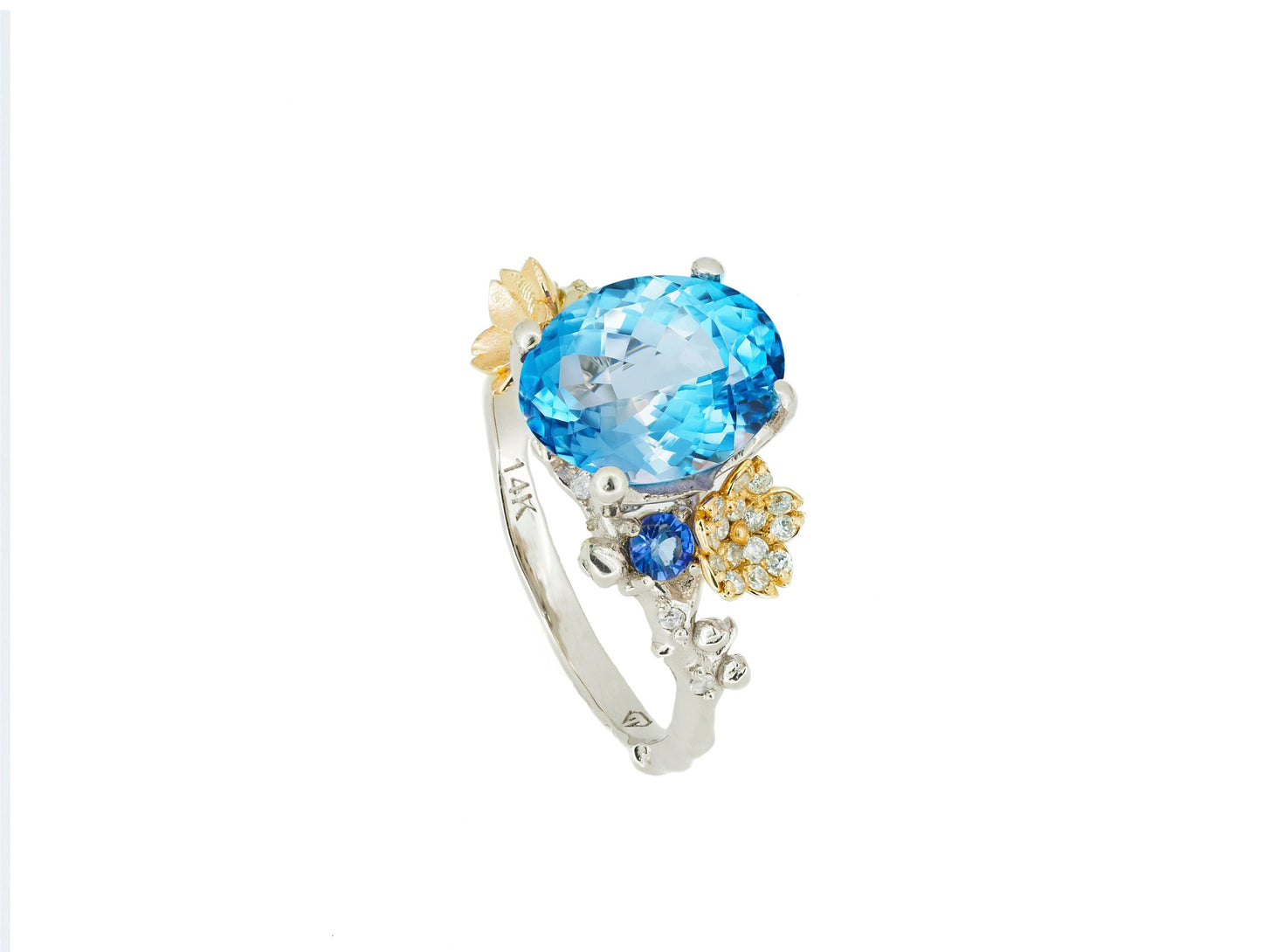Blue Topaz cocktail ring in 14k gold