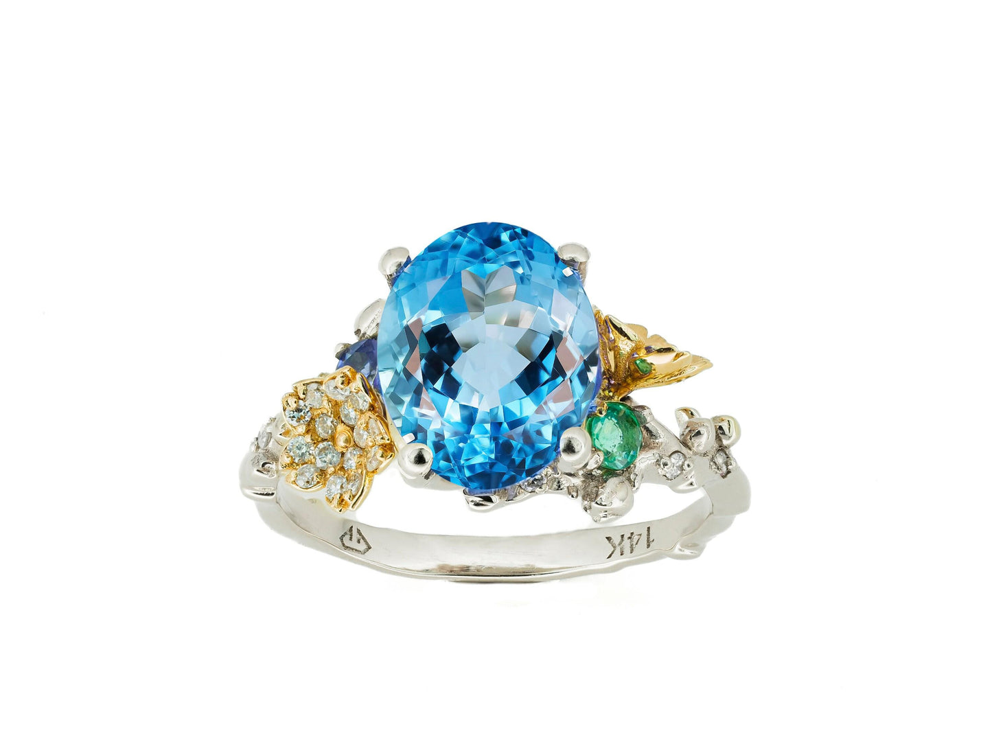 Blue Topaz cocktail ring in 14k gold