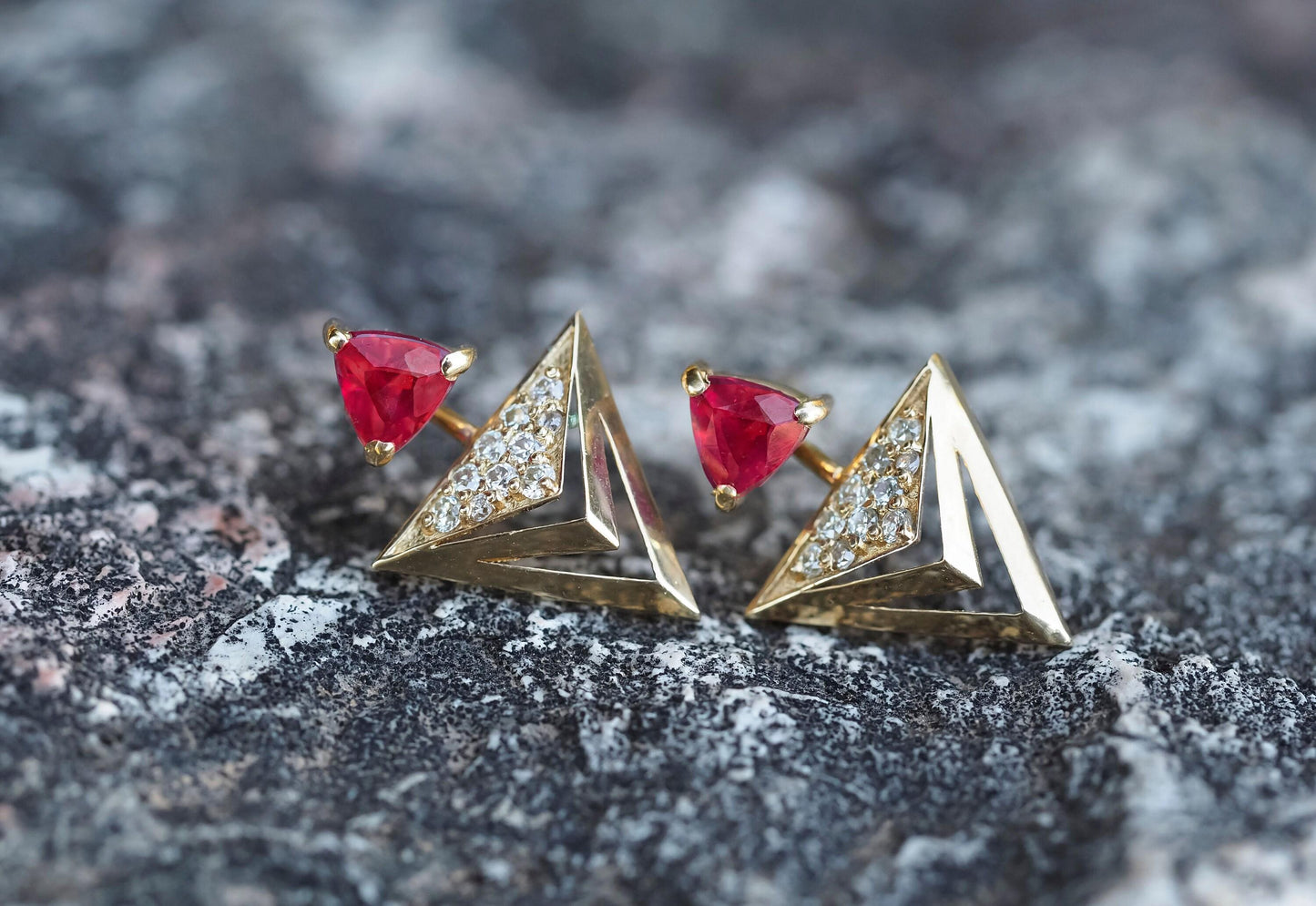 Trillion cut ruby stud earrings in 14k solid gold