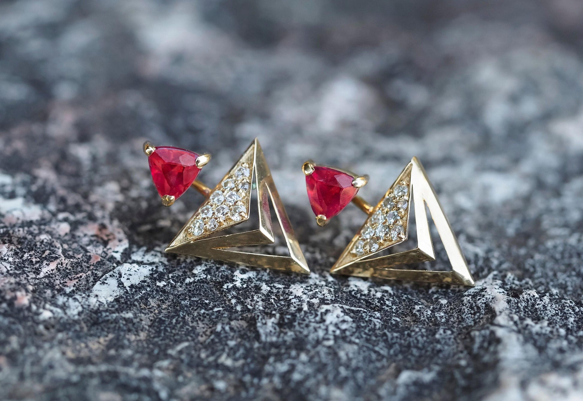Trillion cut ruby stud earrings in 14k solid gold