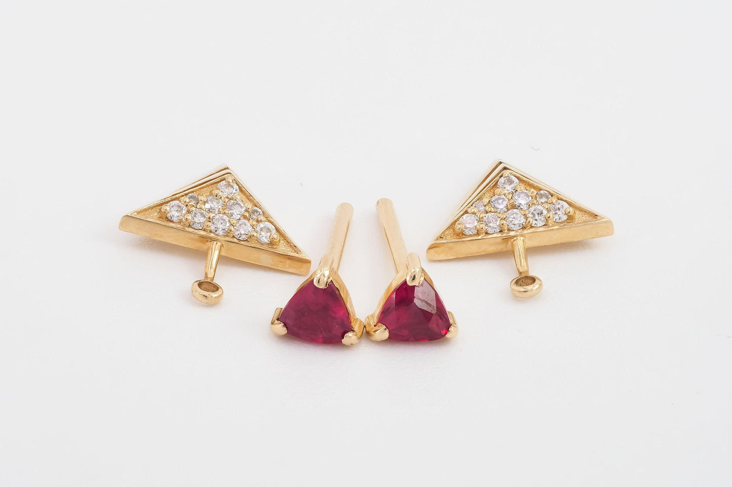 Trillion cut ruby stud earrings in 14k solid gold