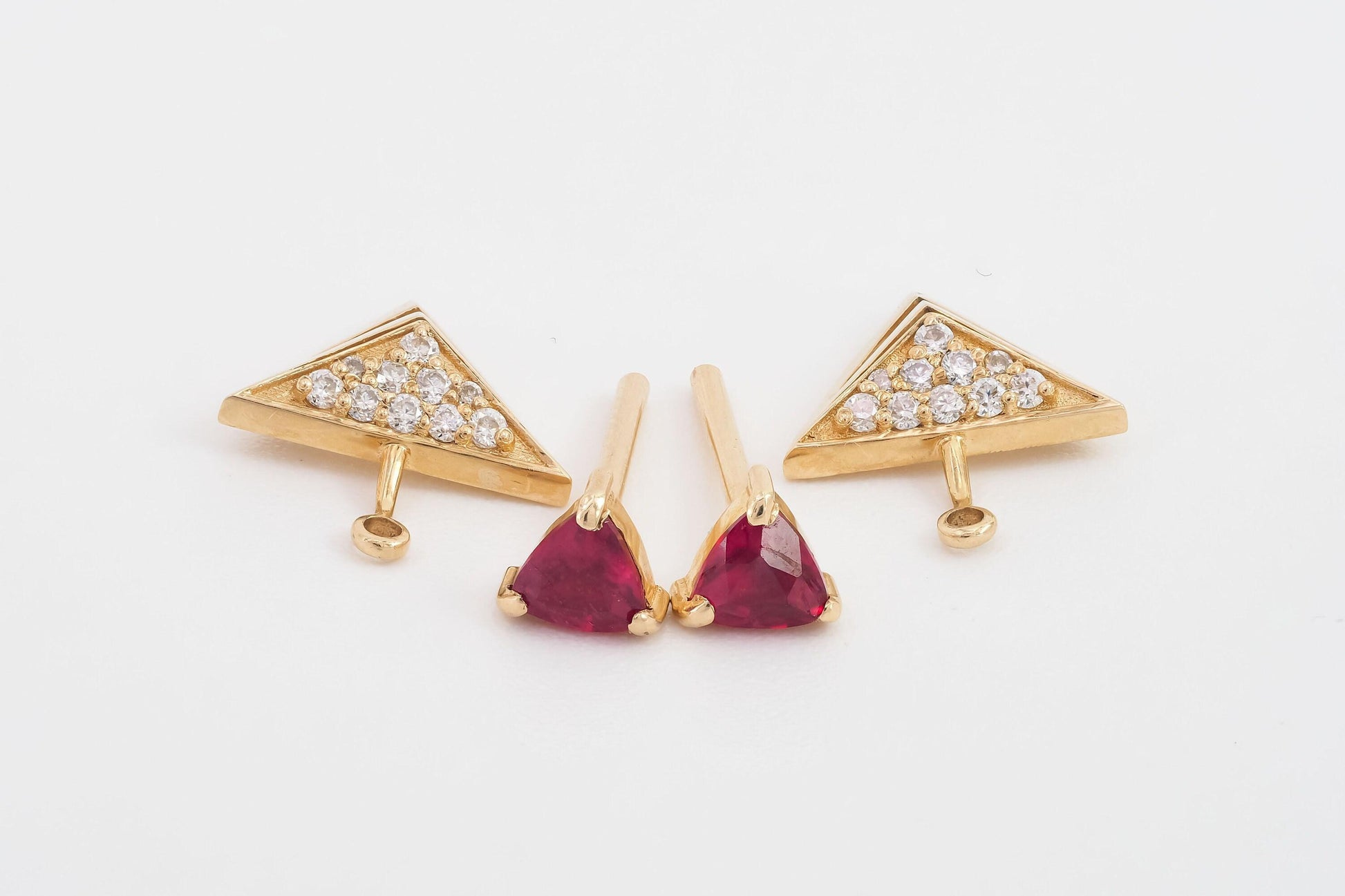 Trillion cut ruby stud earrings in 14k solid gold