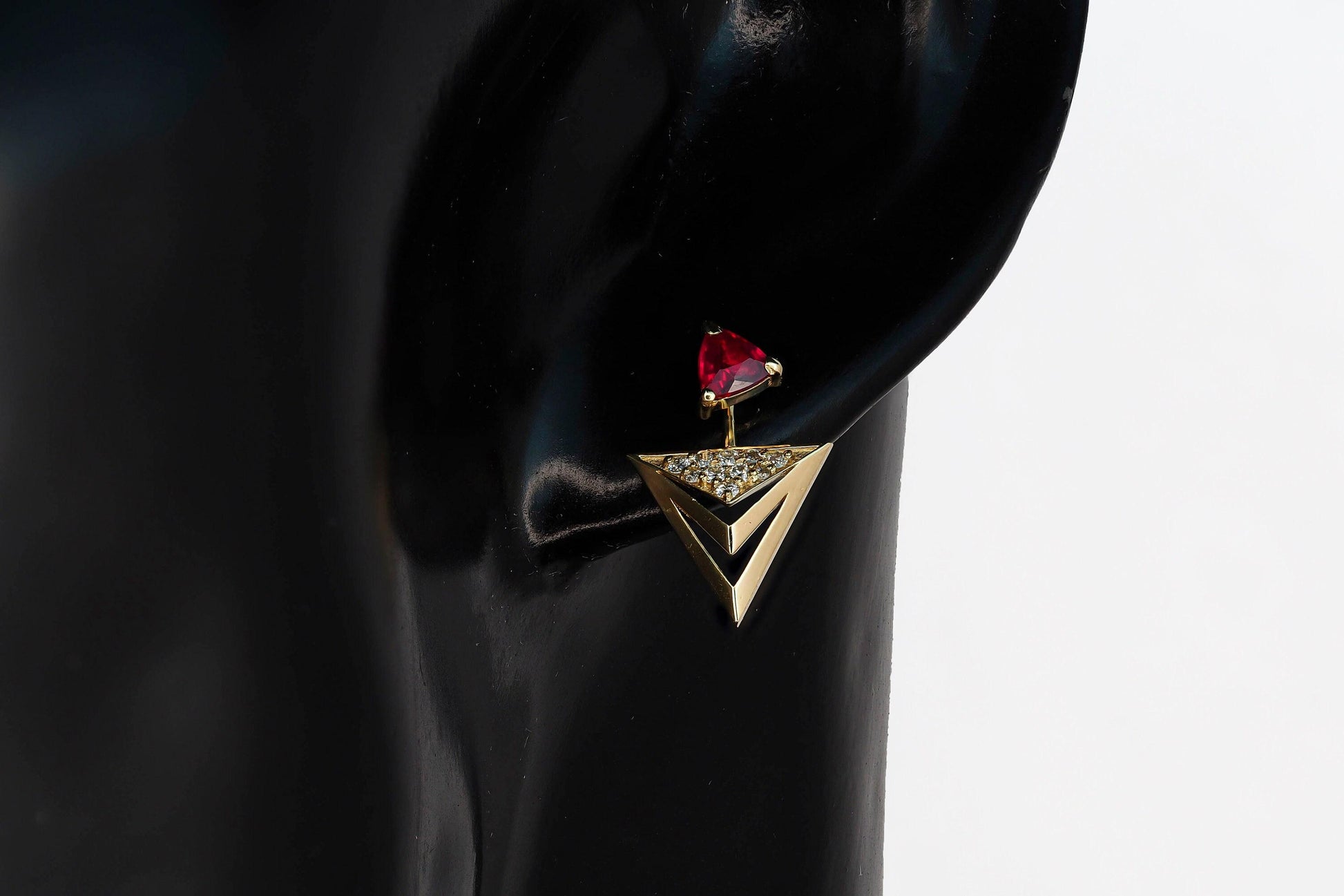 Trillion cut ruby stud earrings in 14k solid gold