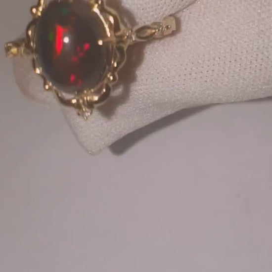 Black opal 14k gold ring