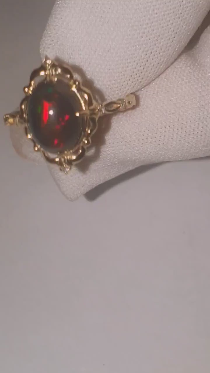 Black opal 14k gold ring