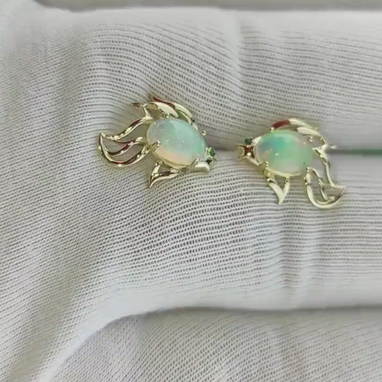 14k gold Fish earrings studs set in 14k gold