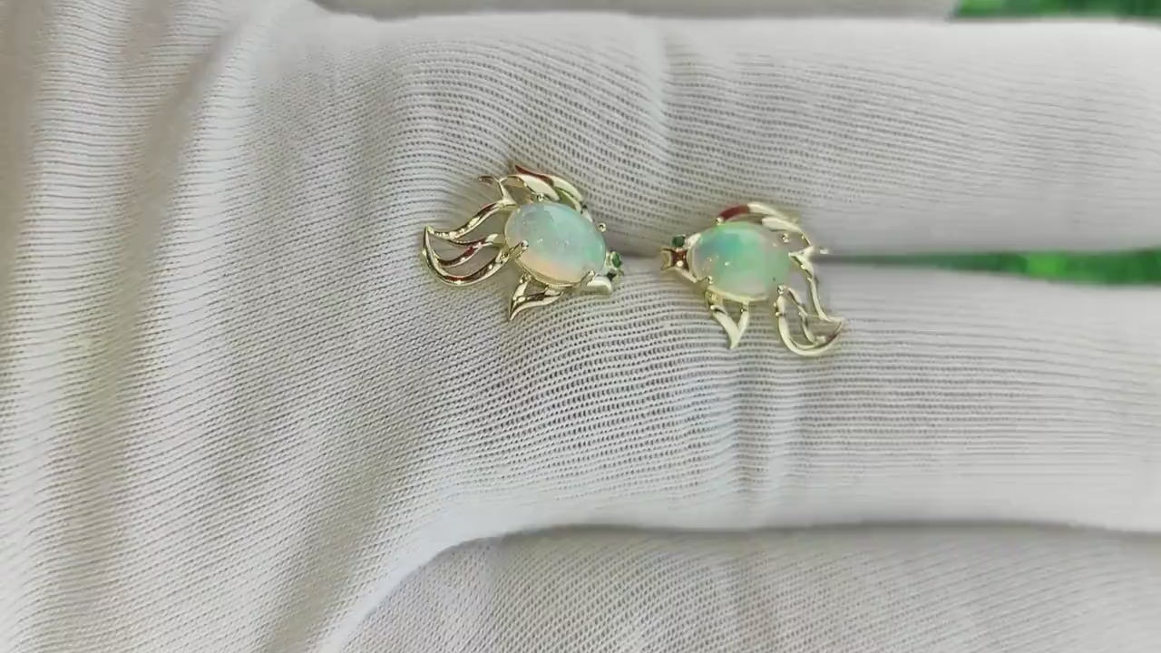 14k gold Fish earrings studs set in 14k gold