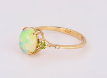 Load image into Gallery viewer, 14 k gold ring with opal and diamonds.  Dainty opal ring. Opal promise ring.  Opal and peridot ring. Opal engagement ring. Peridot ring.