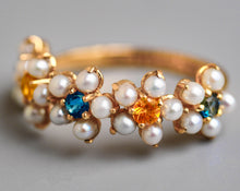 Load image into Gallery viewer, Semi Eternity 14 K Gold Sapphire September Birthstone and Pearl ring. Chamomile ring.  Ring with blue and yellow sapphires. Flower ring.