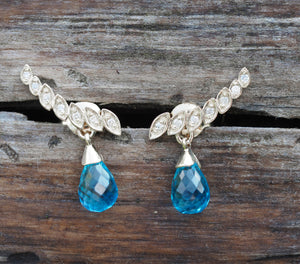 Sky blue Topazes and diamonds 14k gold earrings studs. Briolette topazes earrings.  Gold drop earrings. Statement earrings.