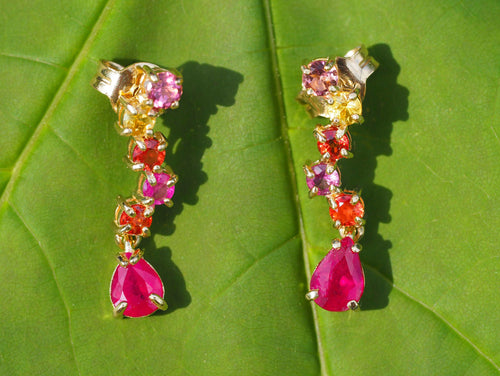 14 kt gold earrings studs with pear rubies and sapphires . Red, pink, orange and yellow gemstone studs.  Colorfull earrings