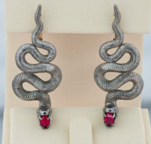 Load image into Gallery viewer, Massive snake earrings.  Genuine ruby and diamond earrings. Two metal earrings: yellow gold, silver. Black mamba earrings.