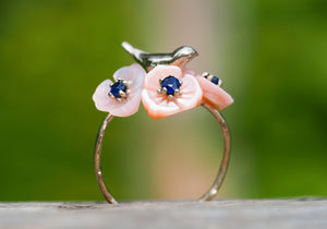 14k gold ring with round sapphires. Shell flower gold ring. Bird on branch ring. Bird on twig ring. Blue sapphire ring. Floral gold ring.