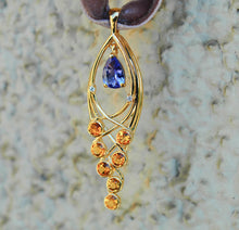 Load image into Gallery viewer, Solid 14 Kt Gold Pendant with natural Tanzanite, Sapphires and Diamonds. Yellow sapphire pendant. Teardrop Tanzanite. December birthstone.