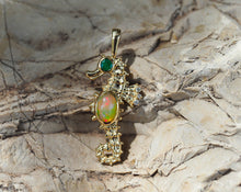 Load image into Gallery viewer, Solid 14 K Gold Seahorse pendant with opal and emerald. Multicolor Ethiopian Opal gemstone. Ocean Mermaid Pendant. Handmade Charm.