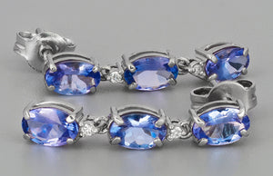 Tanzanite earrings studs. 14k solid gold studs. Oval tanzanite earrings. Blue gemstone earrings.