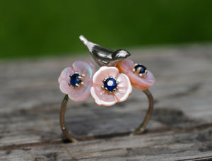 14k gold ring with round sapphires. Shell flower gold ring. Bird on branch ring. Bird on twig ring. Blue sapphire ring. Floral gold ring.