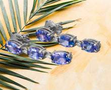 Load image into Gallery viewer, Tanzanite earrings studs. 14k solid gold studs. Oval tanzanite earrings. Blue gemstone earrings.
